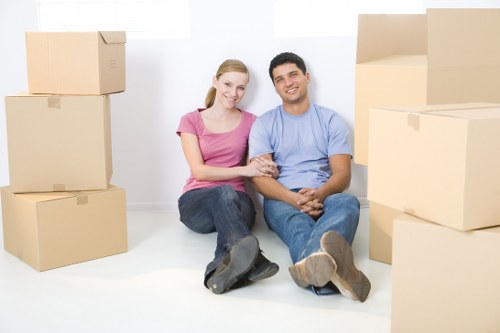 Professional movers handling furniture during a local move in Gipsyhill