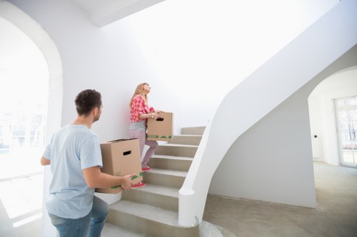 Professional office moving team handling furniture and equipment in Gipsyhill